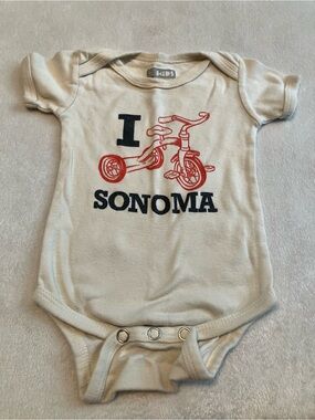 Organic Sonoma Cream Bodysuit with Red Tricycle Graphic